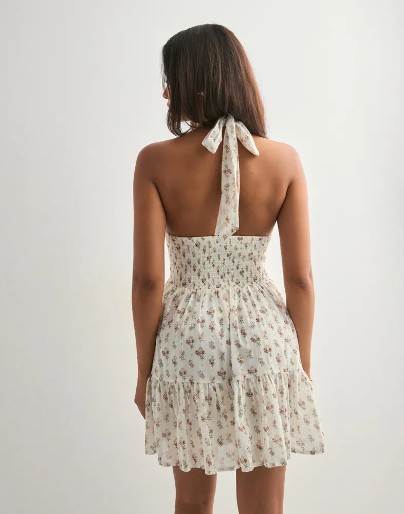Neo Noir Magda Finom mintás krémszínű virágos halter mini ruha – ráncolt derékrésszel, nyitott hátrésszel | Nők