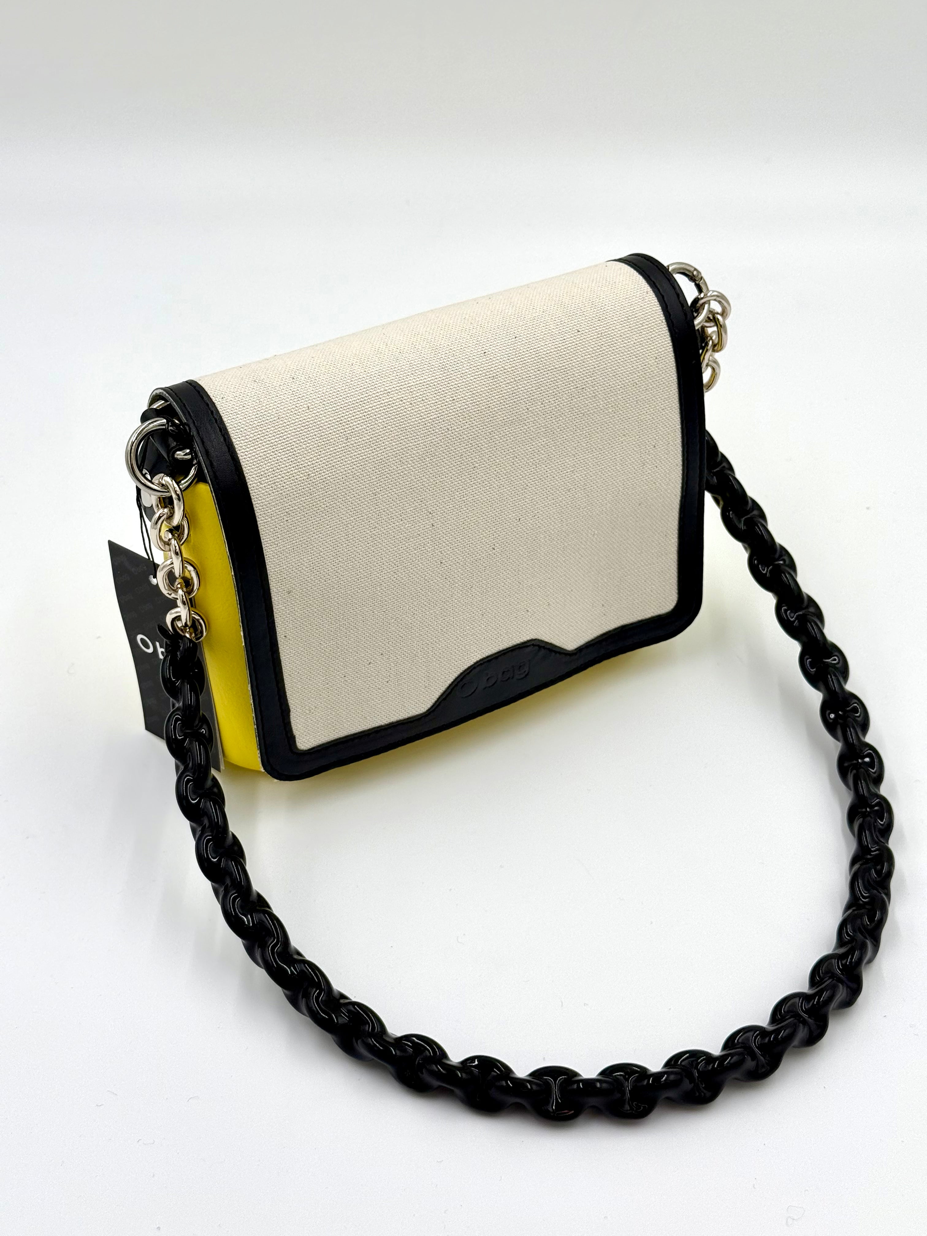 O bag Pocket mini bag – lemon yellow body, white lid, black chain strap