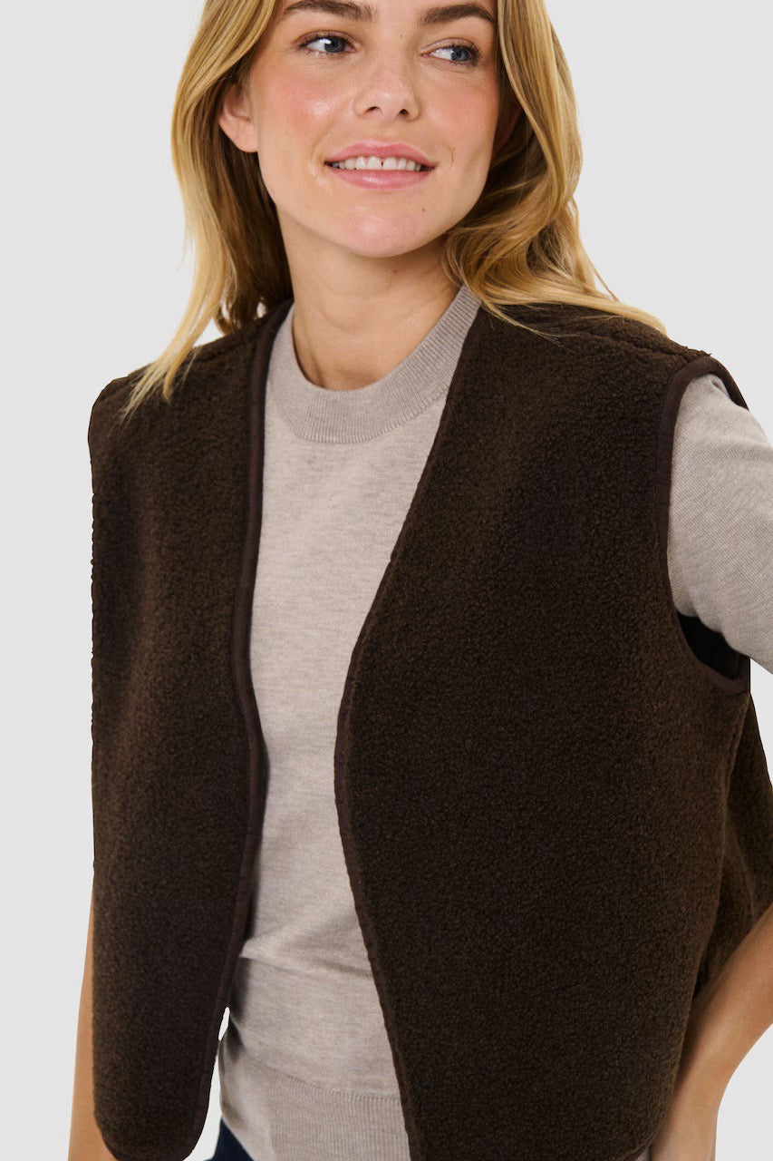 Close-up of the Saint Tropez IcariaSZ vest in mocha, showing the fleece texture and tonal edge trim