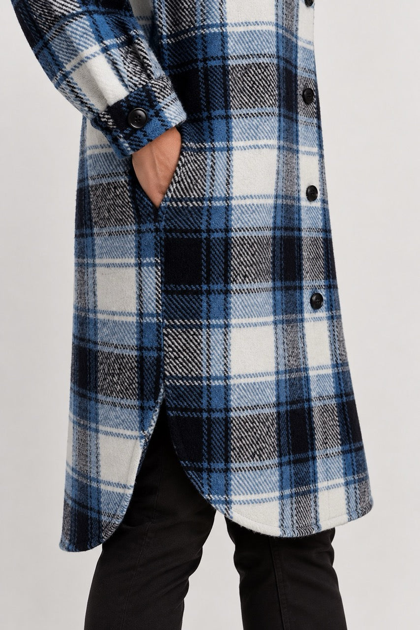 Detail of the ICHI IHELISABETTE blue checked jacket showing the side pocket, buttoned cuff and rounded hem.